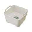 Afwasteil Wash & Drain van Joseph Joseph beige met groene dop