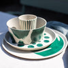 Bio servies Connect van Koziol diner bord-dessert bord-bowl-en beker in Monstera print