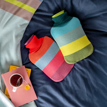 Hot water bottle with soft knitted cover and colorful stripes - Remember